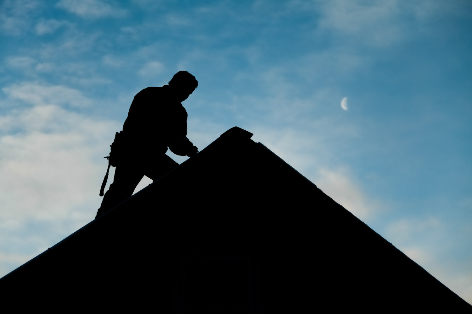 Contractor Working on Roof